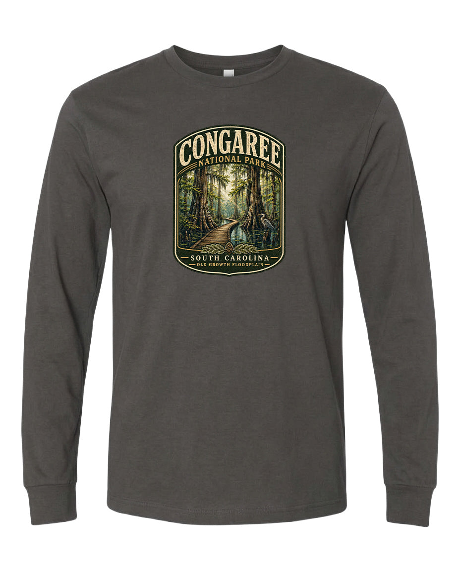 A gray long-sleeved t-shirt with a graphic design depicting a forest scene, featuring a path leading through the trees.