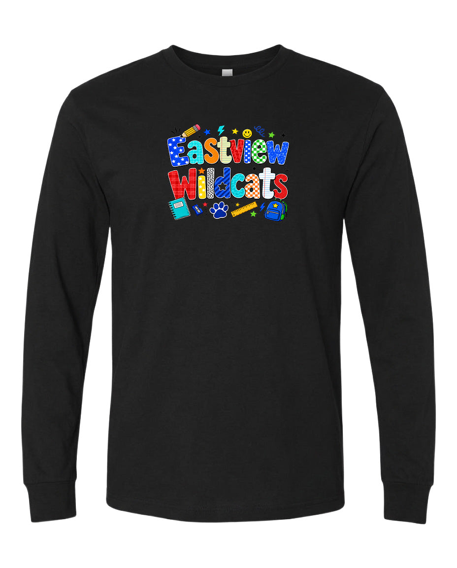 A black long-sleeved t-shirt with a colorful graphic design featuring the text "Eastview Wildcats" and various school-related icons such as pencils, books, and a backpack.