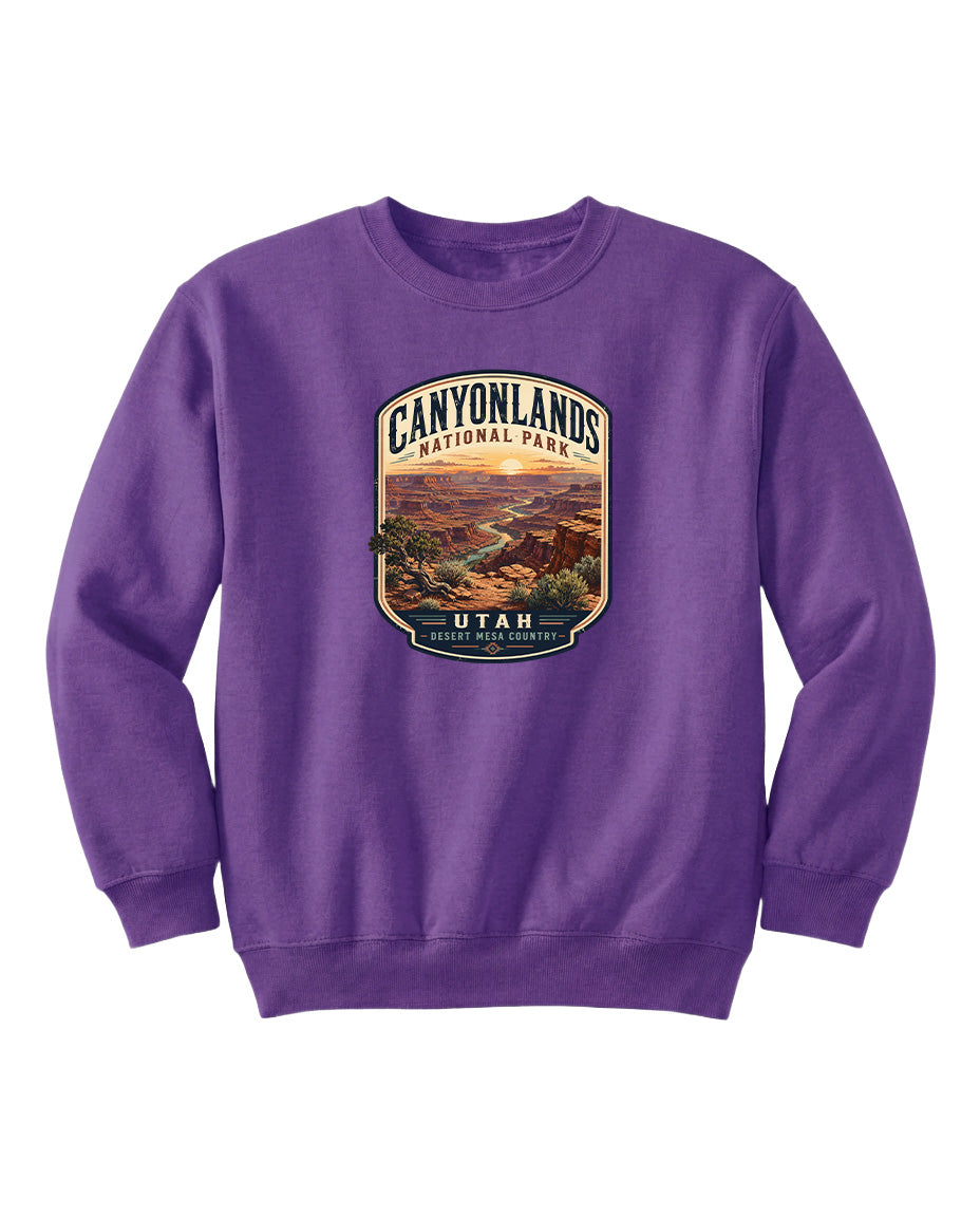 A purple sweatshirt with a graphic design depicting the scenic landscape of Canyonlands National Park in Utah.