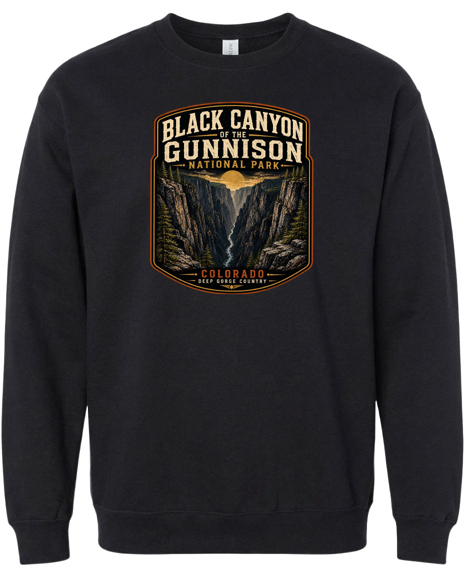 A black sweatshirt with a graphic design depicting the Black Canyon of the Gunnison National Park in Colorado.