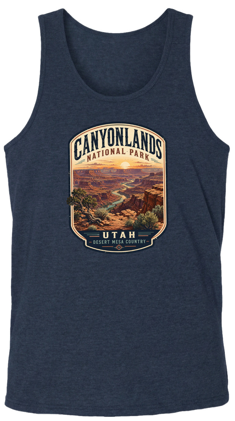 A graphic design on a dark blue tank top featuring a scenic image of the Canyons National Park in Utah, with the text "CANYONLANDS NATIONAL PARK" and "UTAH DESERT MESA COUNTRY" prominently displayed.