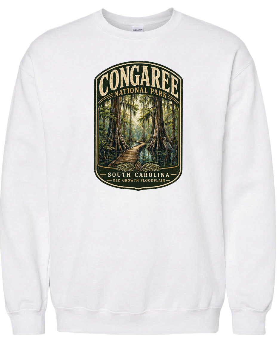 A white sweatshirt with a graphic design depicting a forest scene with a path leading through it.