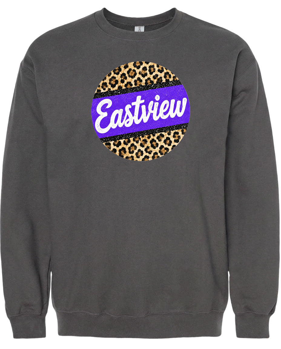 A gray sweatshirt with a large purple circle on the front, featuring a leopard print pattern and the word "Eastview" written in white text.