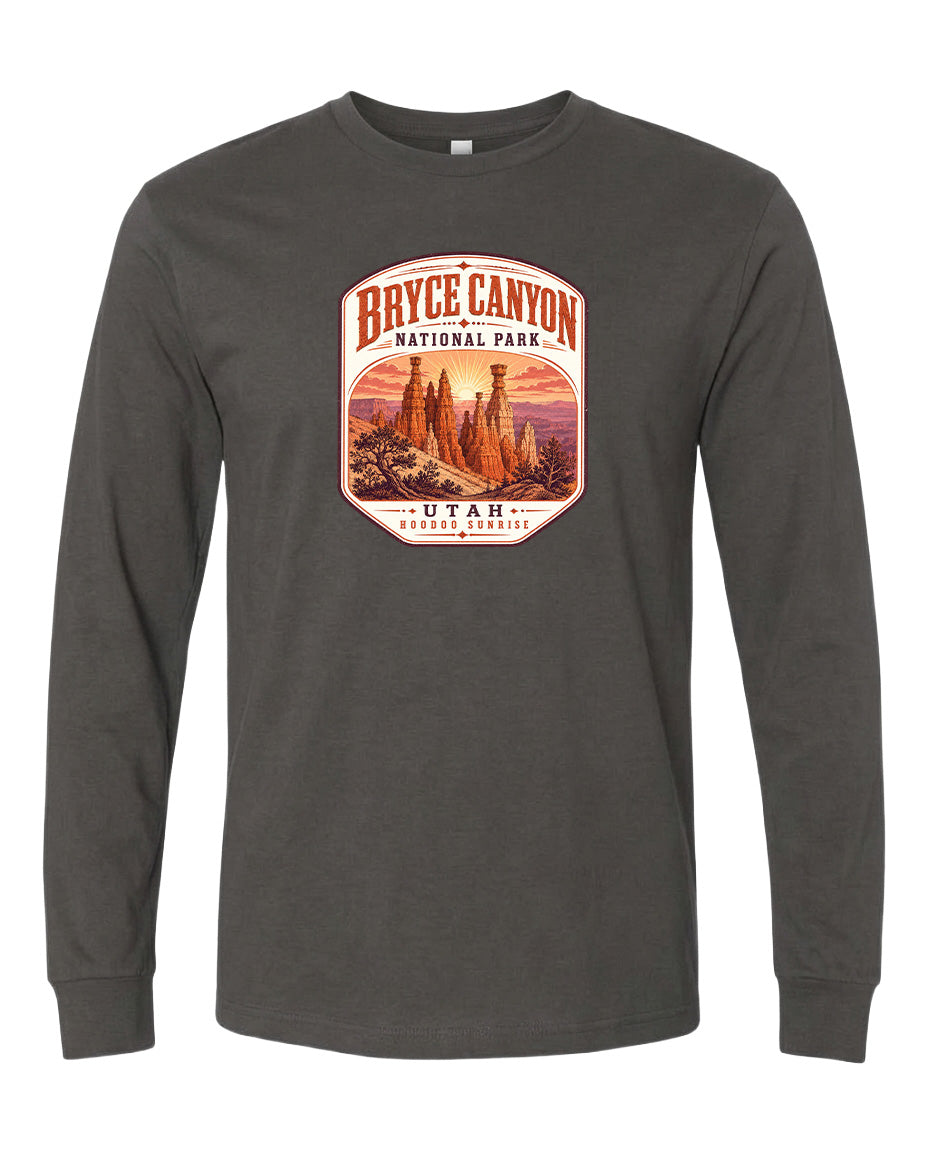 A gray long-sleeved t-shirt with a graphic design depicting the Bryce Canyon National Park in Utah.