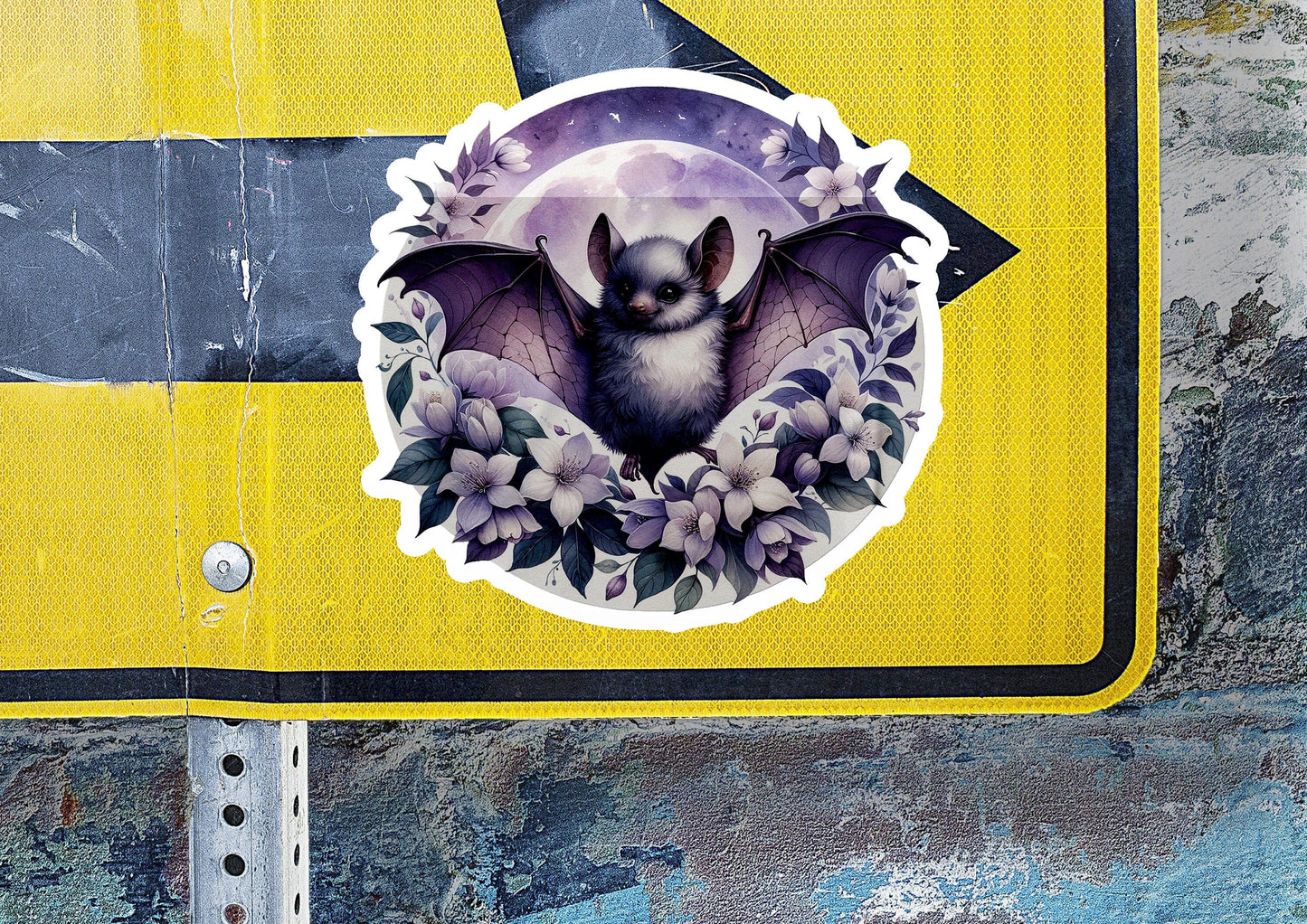 a sticker of a bat with flowers on it
