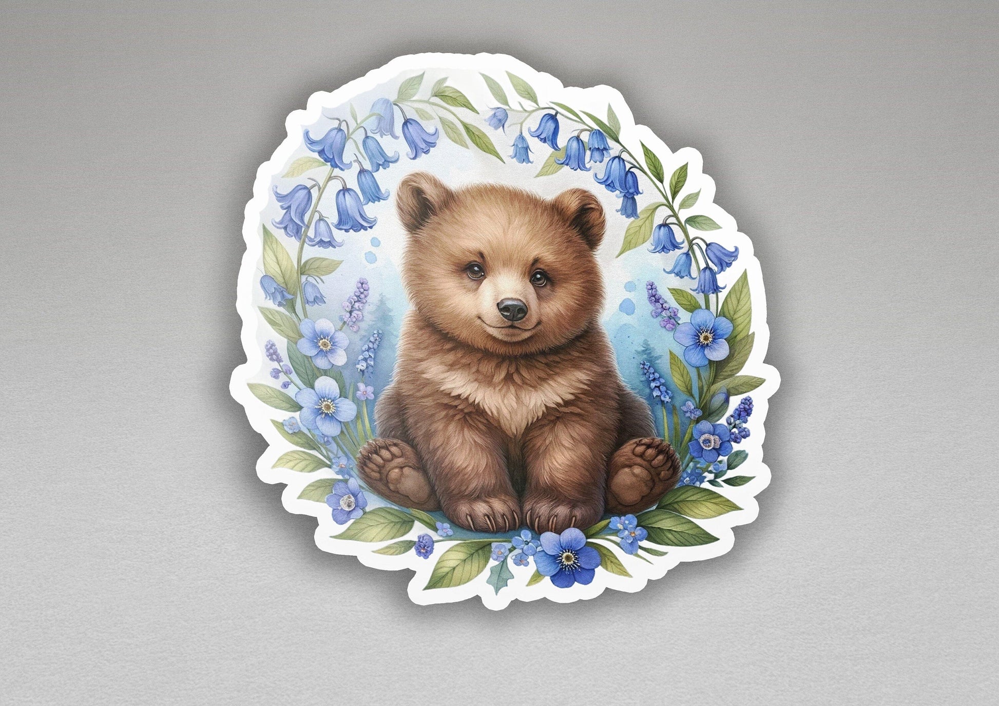 a picture of a brown bear with blue flowers
