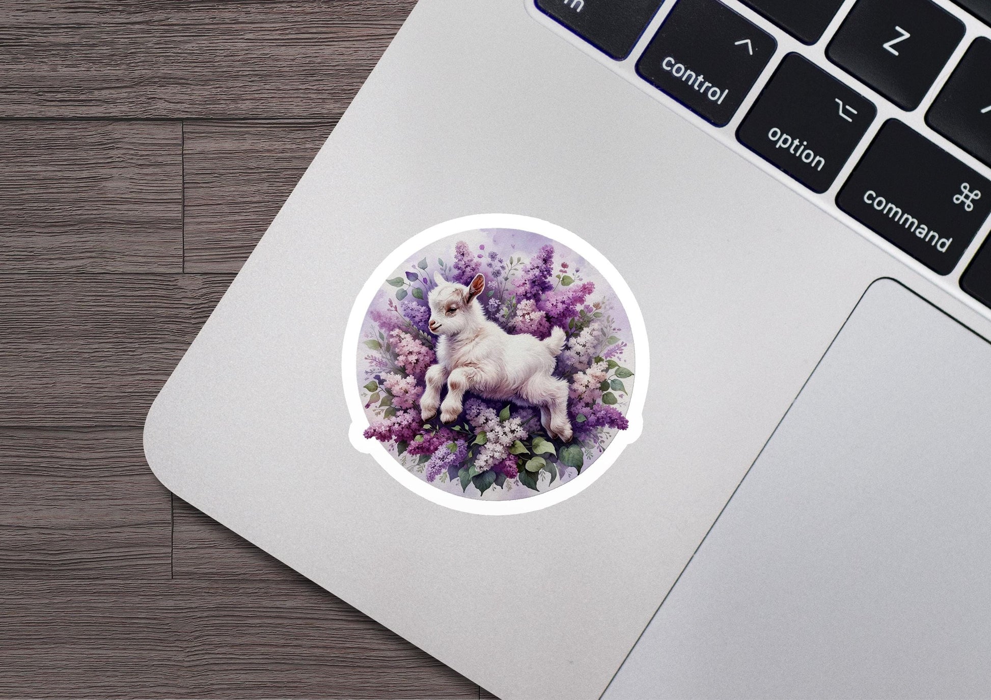 a sticker of a unicorn on a laptop