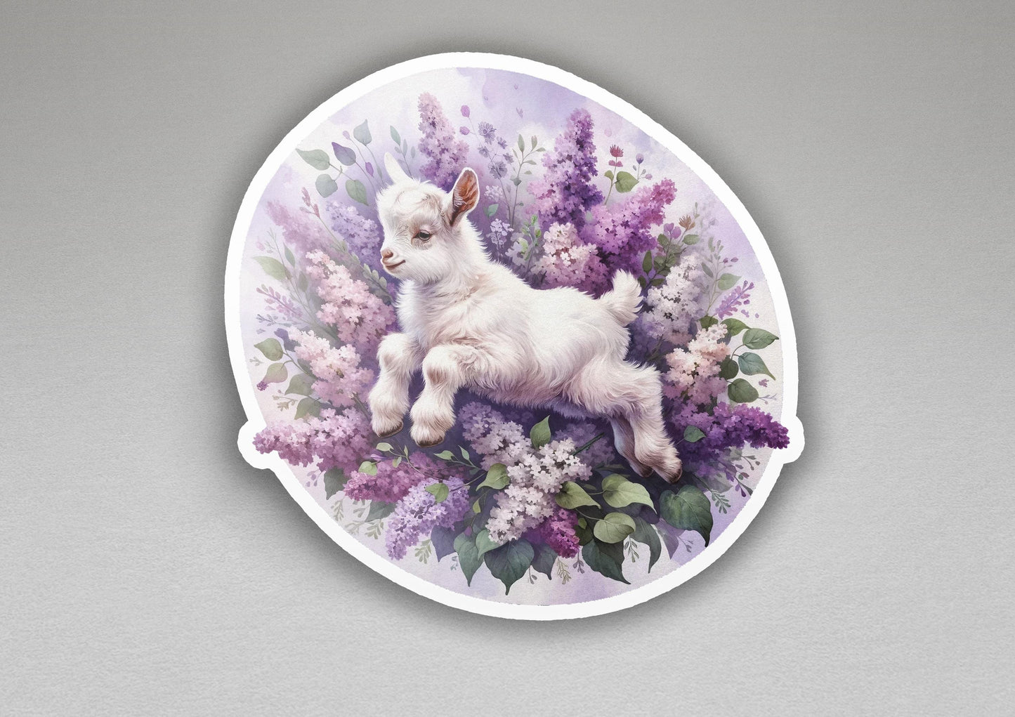 a sticker with a picture of a baby goat on it