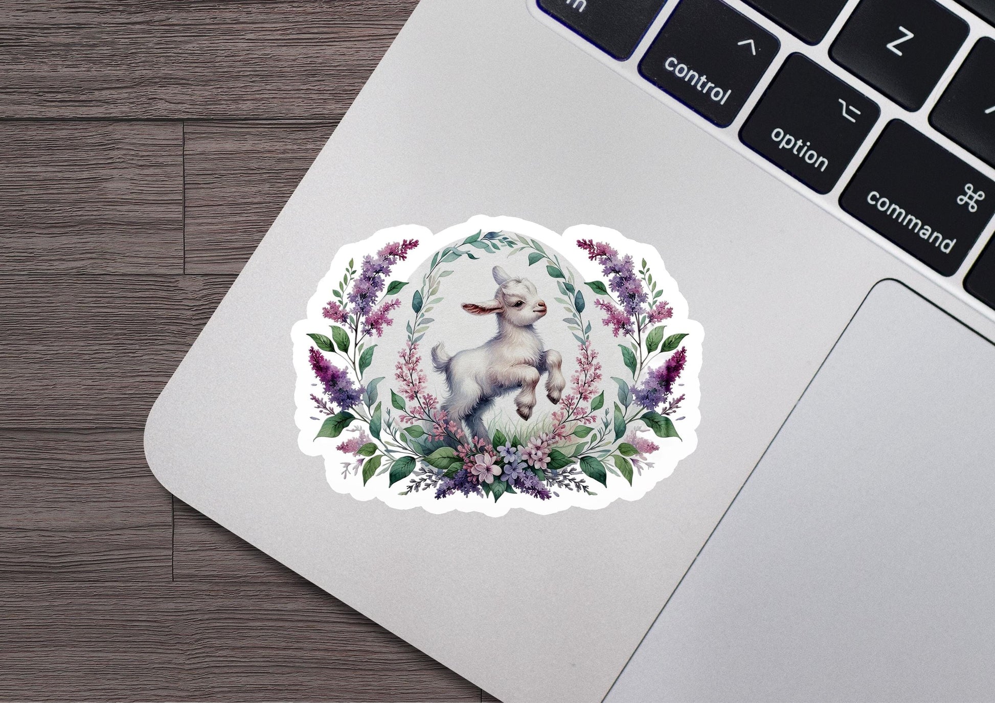 a laptop with a sticker of a dog on it