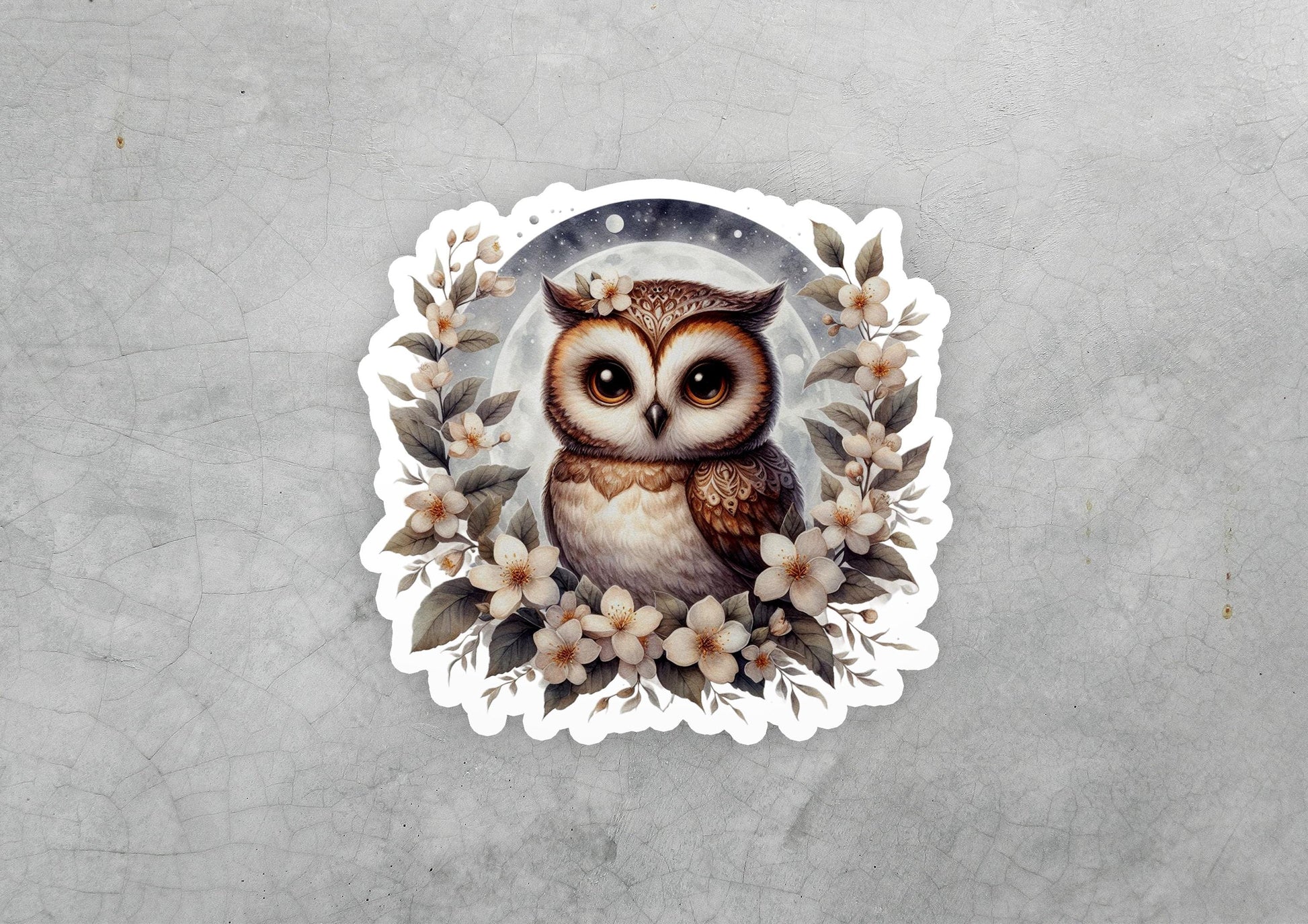 a sticker of an owl surrounded by flowers