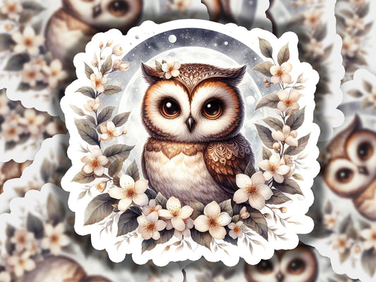 a picture of an owl surrounded by flowers