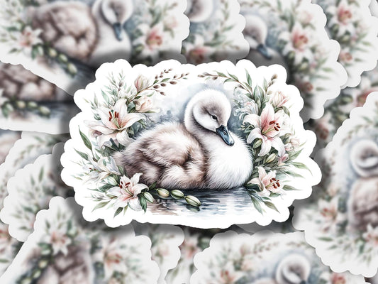 a picture of a swan with flowers around it