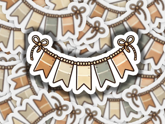 a sticker of a film strip with a bow on it