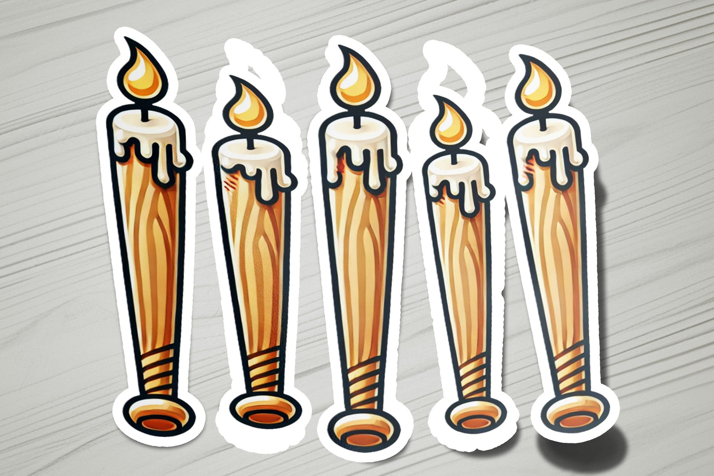 a set of four stickers with candles on them