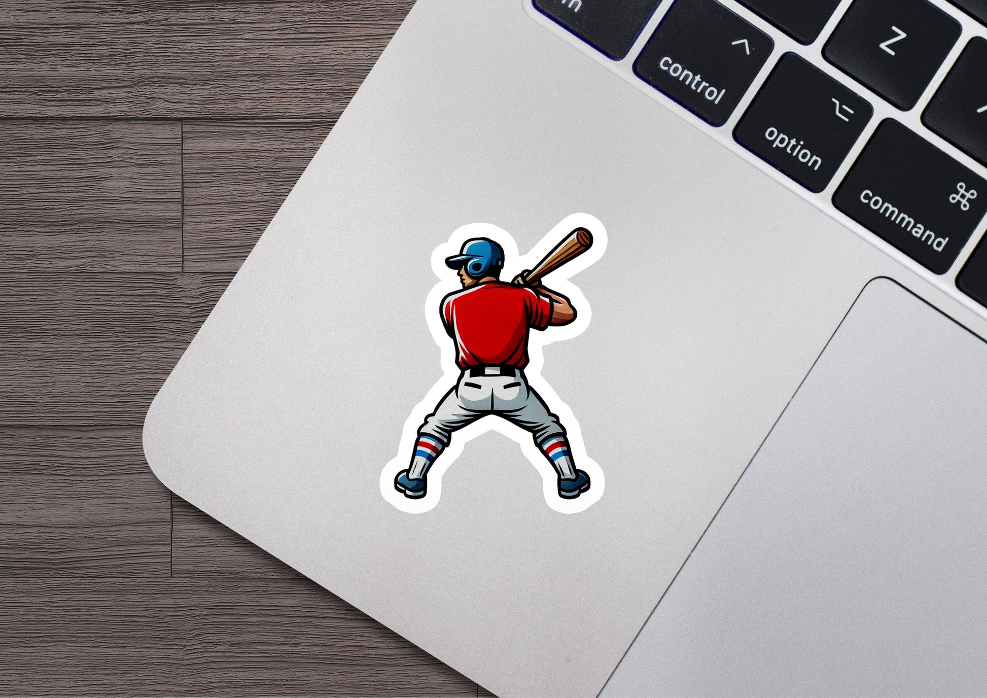 a sticker of a baseball player holding a bat