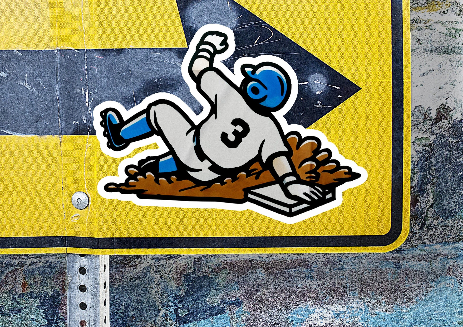 a sticker of a baseball player sliding into a base