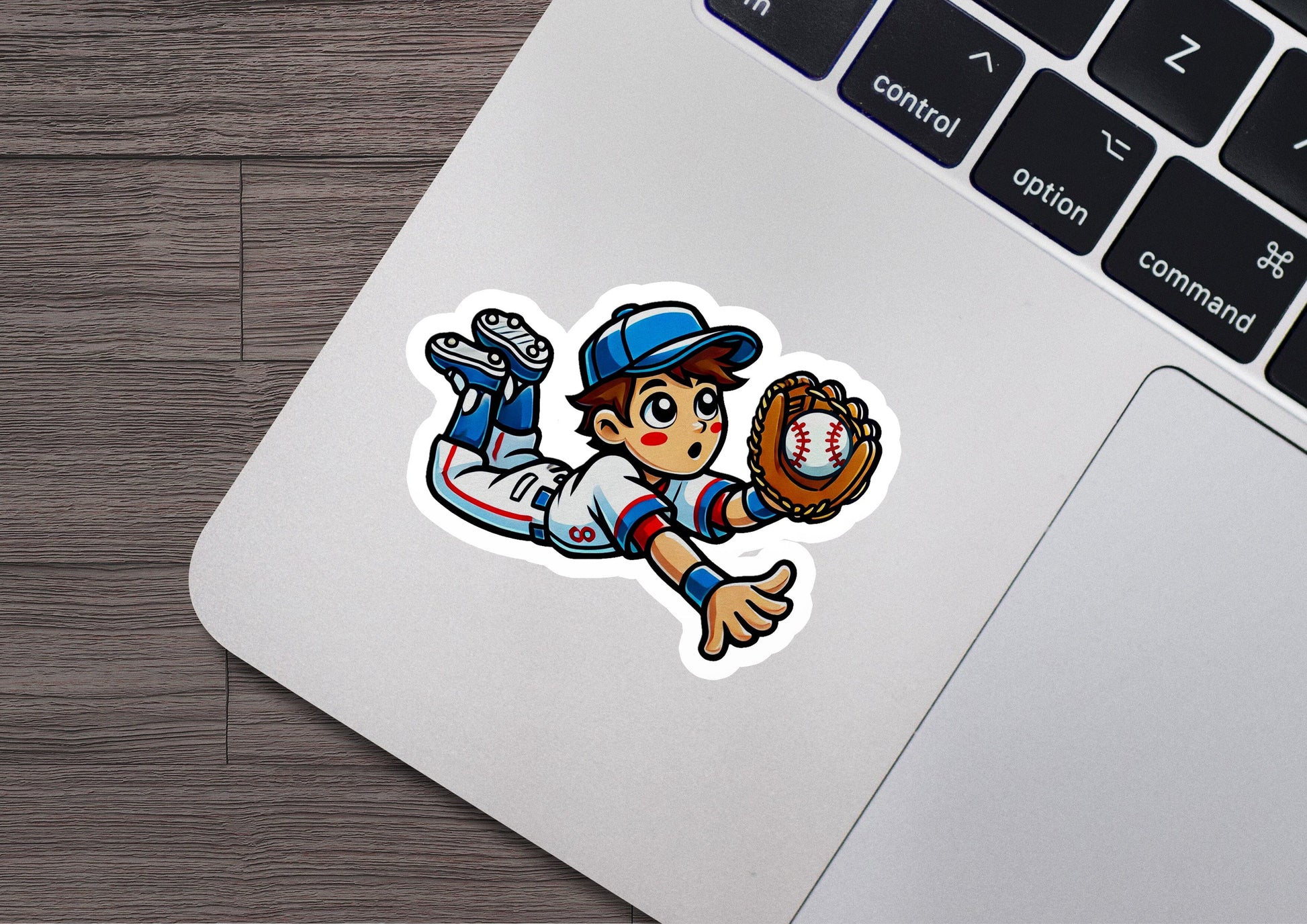 a laptop with a sticker of a baseball player