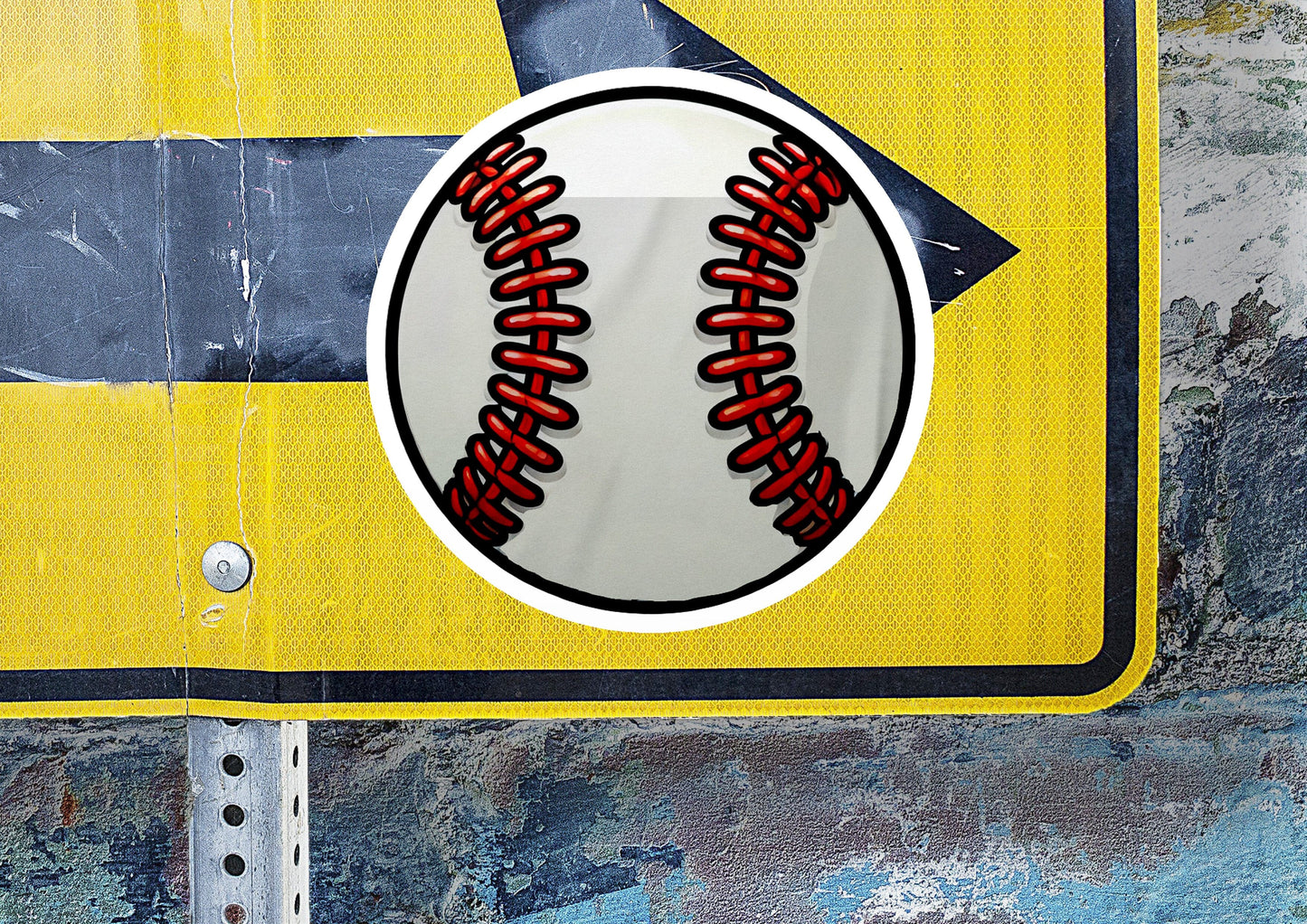 a close up of a street sign with a baseball on it