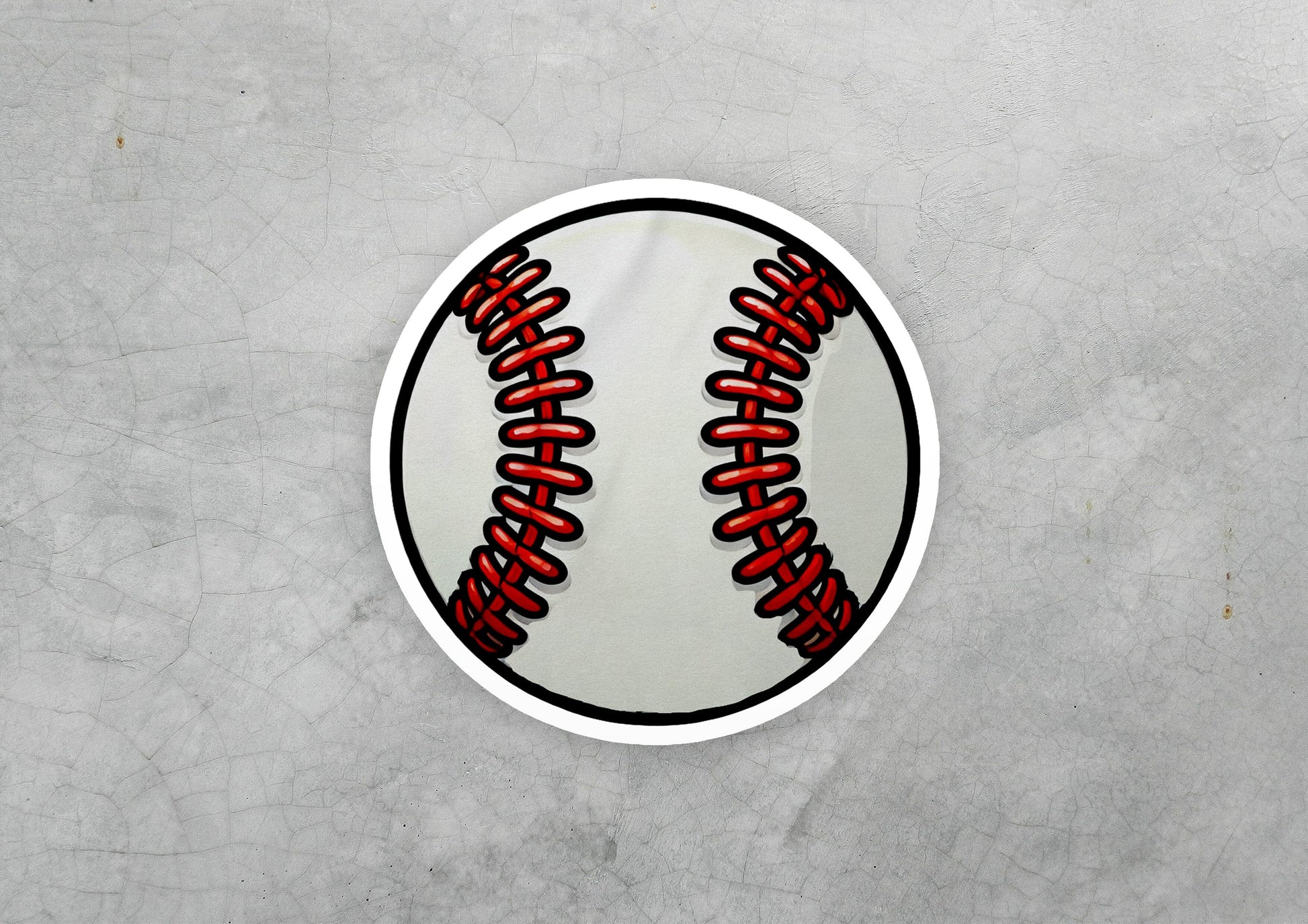 a sticker of a baseball with a red stitching on it