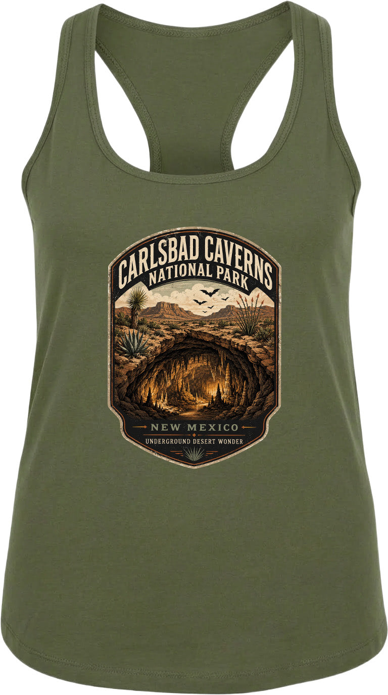 A green tank top with a graphic design depicting the Carlsbad Caverns National Park in New Mexico, featuring a cave, desert landscape, and birds in flight.