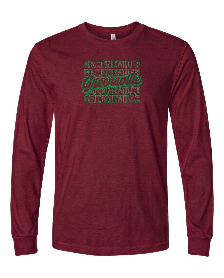 A burgundy long-sleeved t-shirt with a graphic design on the front. The design features the text "Greenville" repeated in a pattern across the shirt.