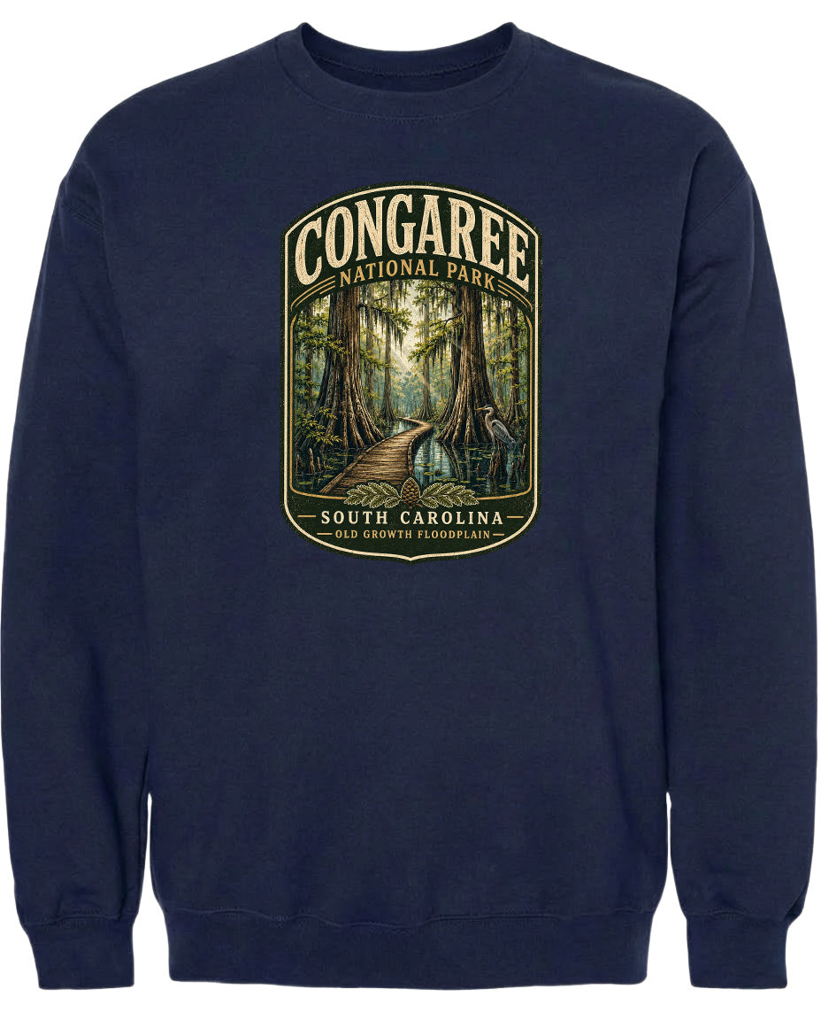 A navy blue sweatshirt with a graphic design depicting a forest scene with a path leading through it.
