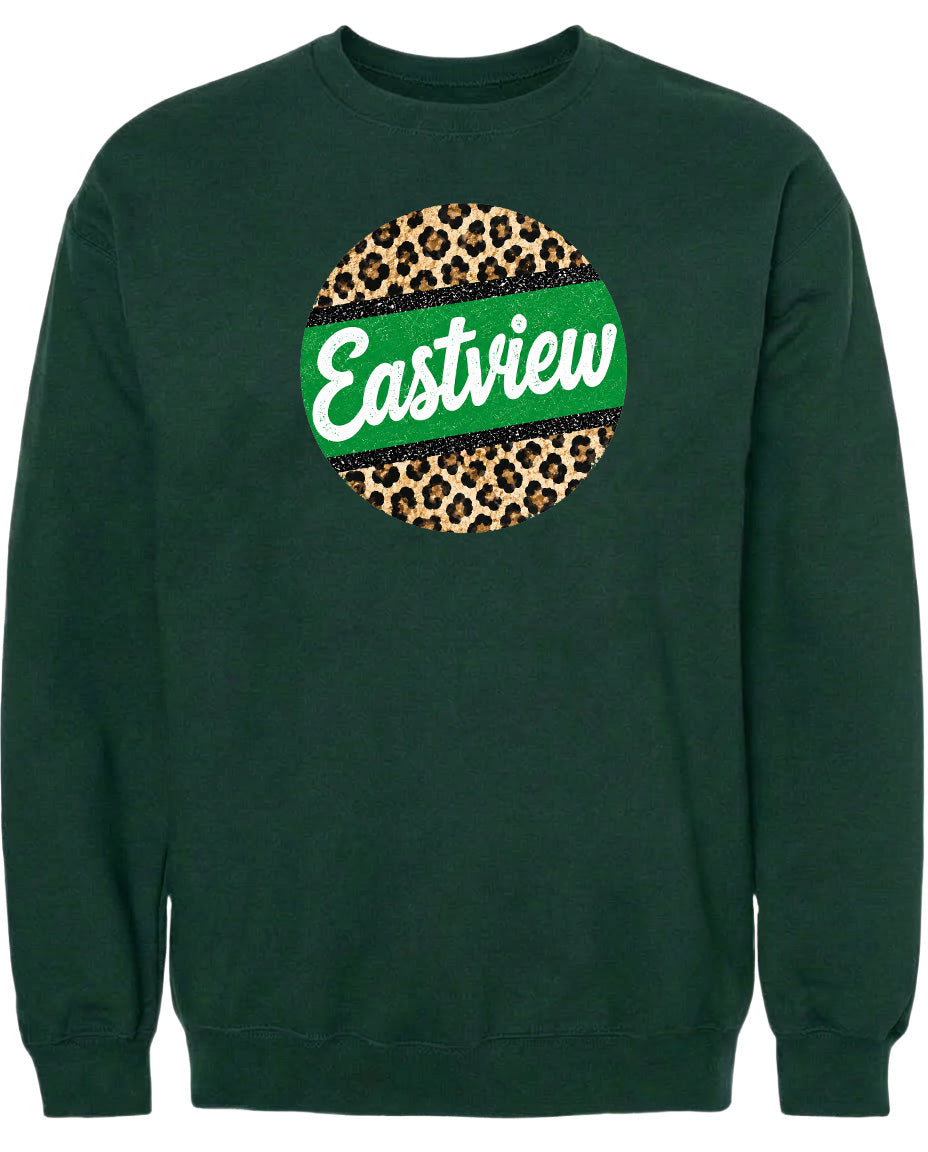 A dark green sweatshirt with a circular logo on the front. The logo features a leopard print design with a green stripe around it.