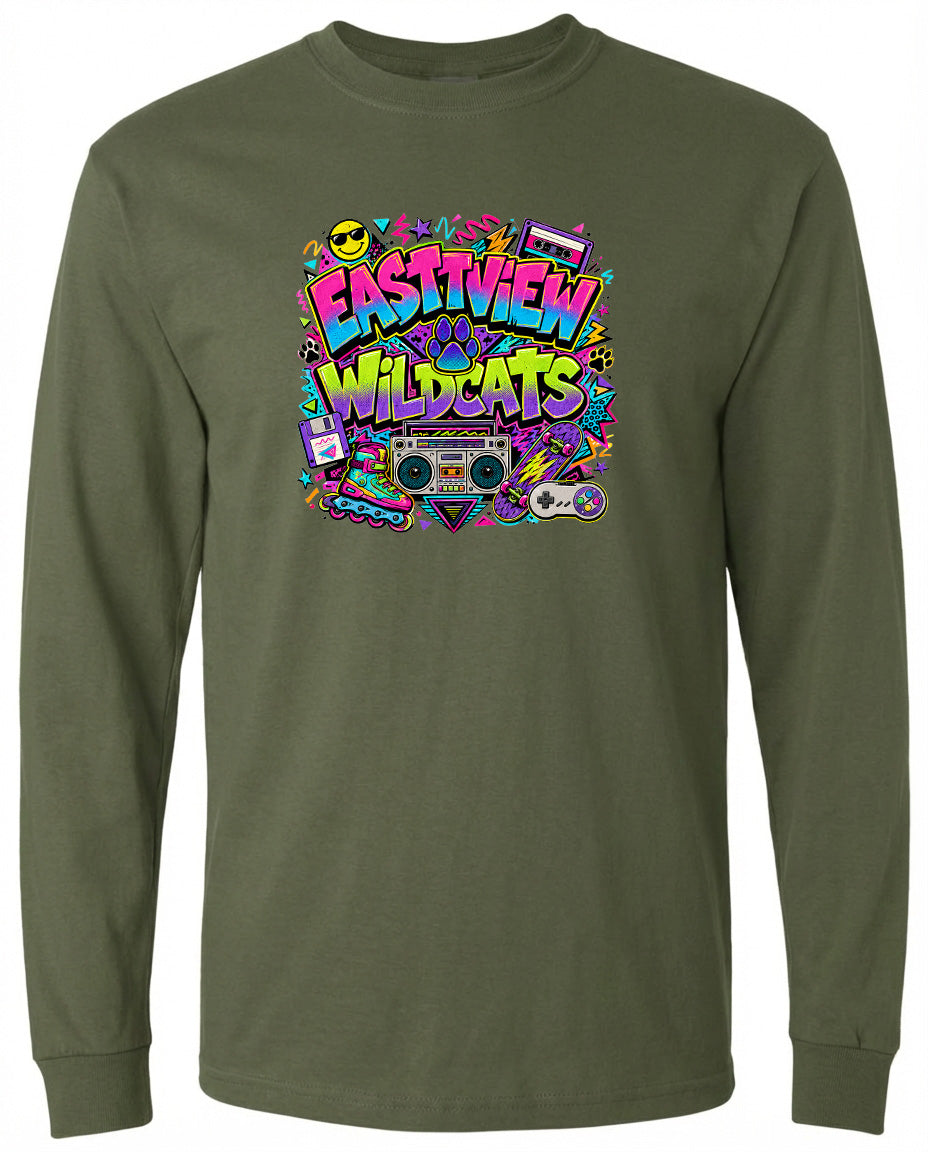 A long-sleeved green t-shirt with a colorful graphic design featuring a boombox, a video game controller, and various other elements, along with the text "EASTVIEW WILDCATS".