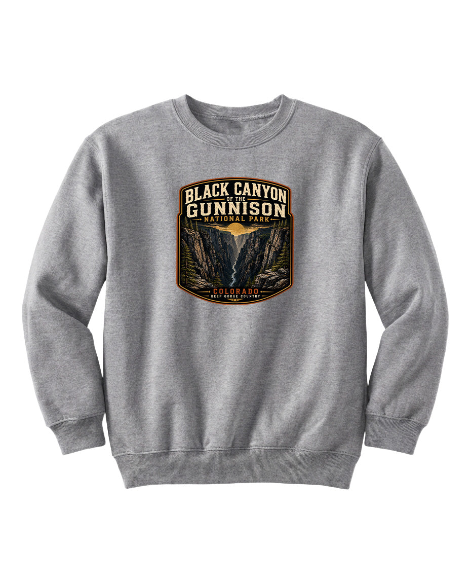 A gray sweatshirt with a graphic design depicting the Black Canyon of the Gunnison National Park.