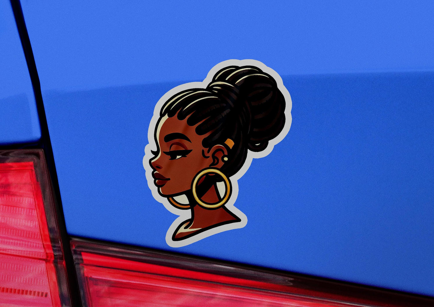 a car with a sticker of a woman's face