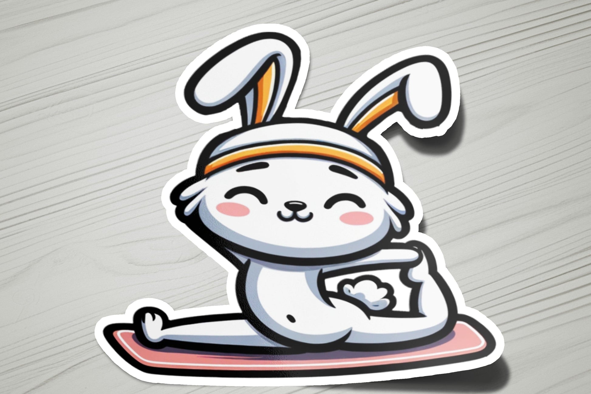 a sticker of a rabbit sitting on a skateboard
