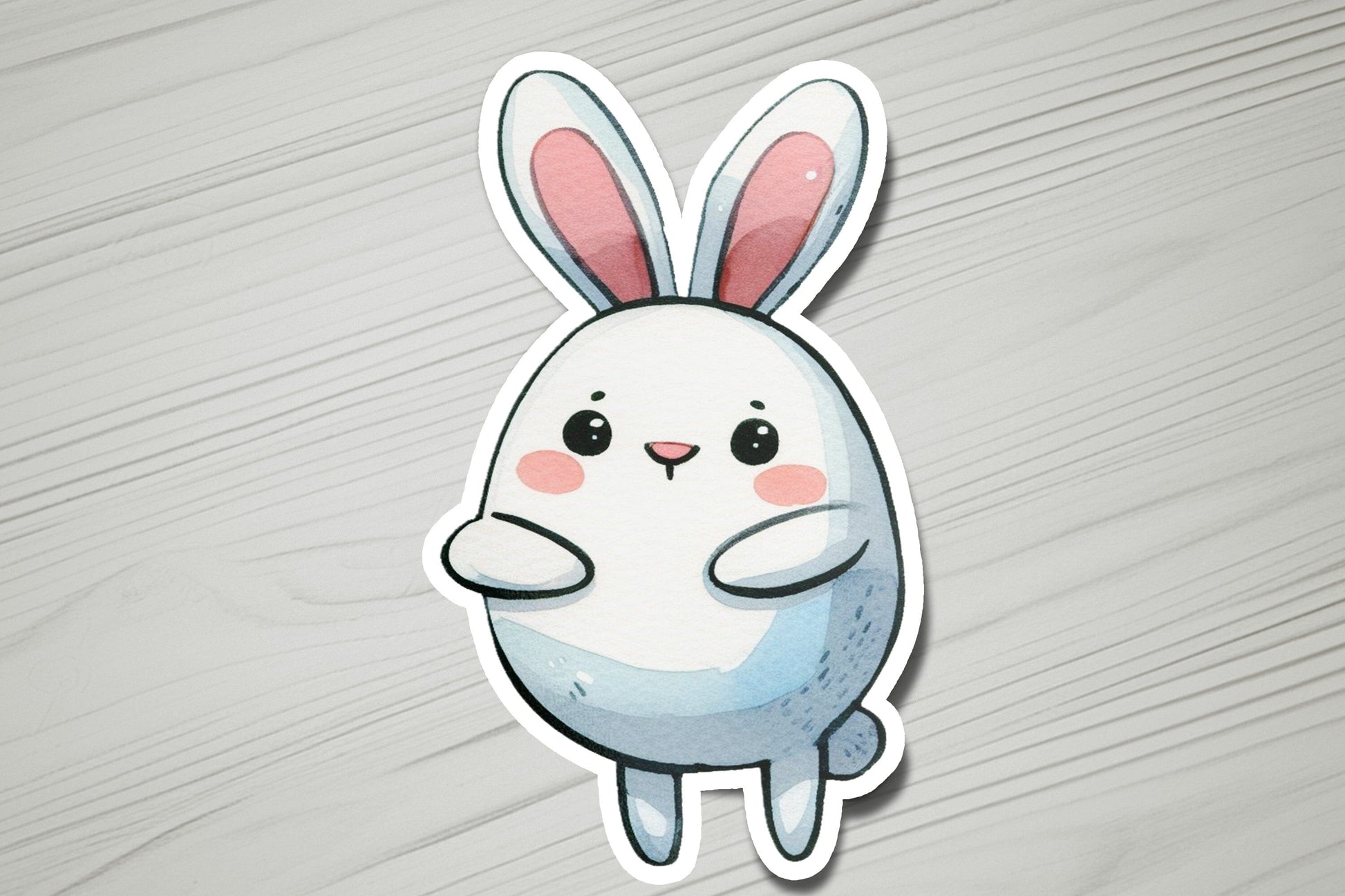 a sticker of a rabbit on a wooden surface