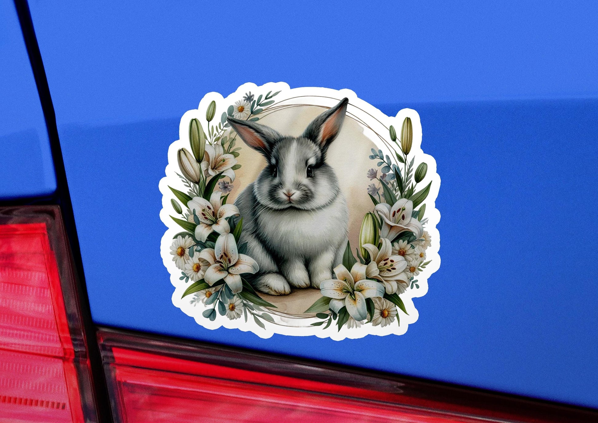 a sticker of a rabbit sitting on the back of a car