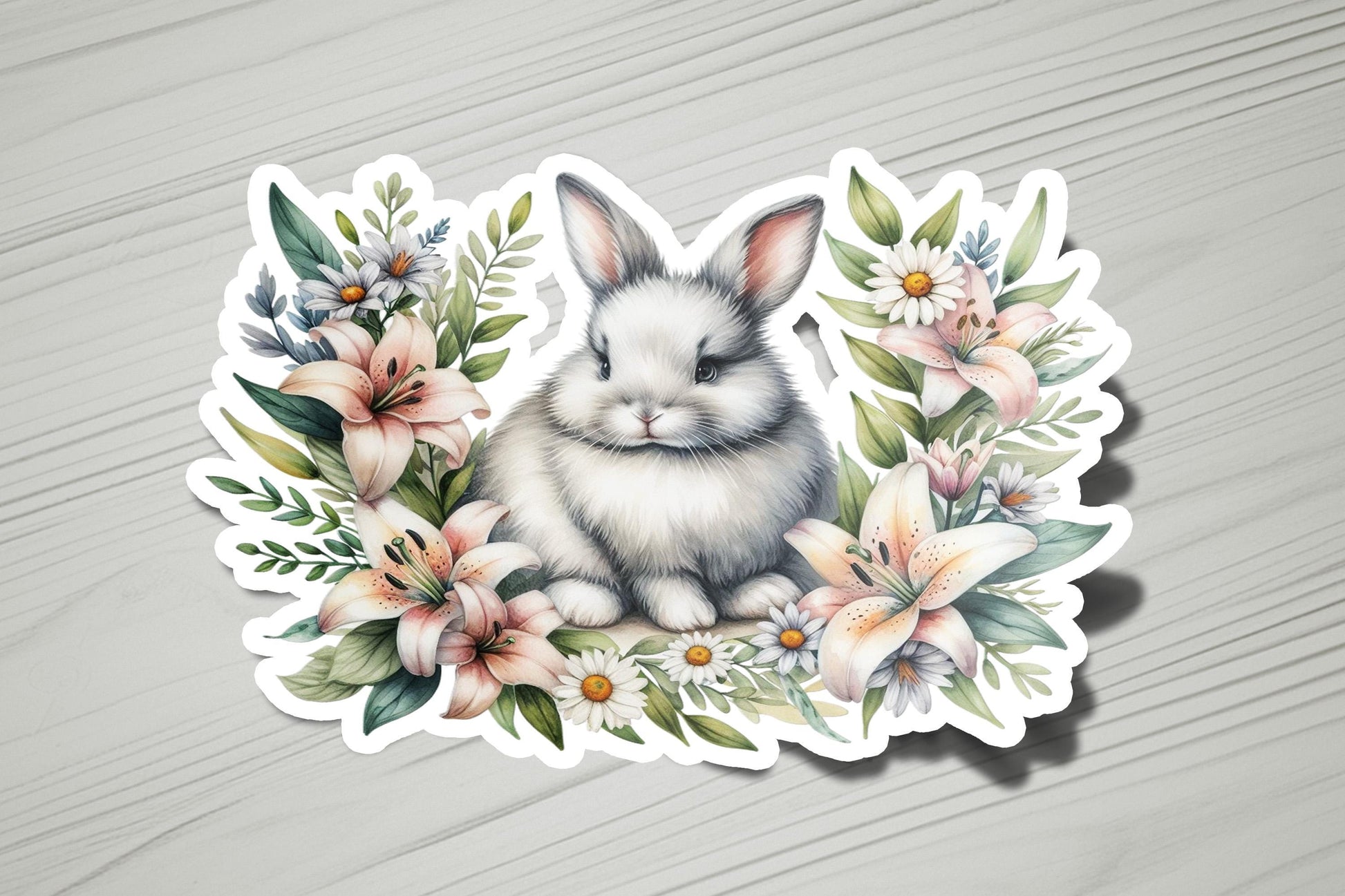 a sticker of a rabbit surrounded by flowers