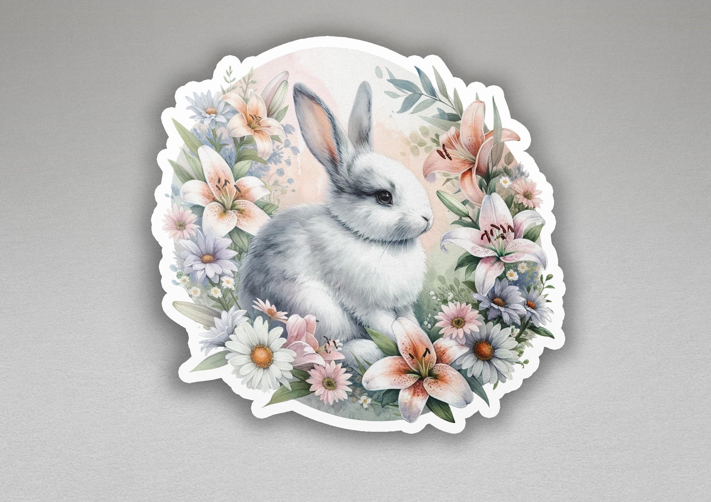 a sticker with a picture of a rabbit surrounded by flowers