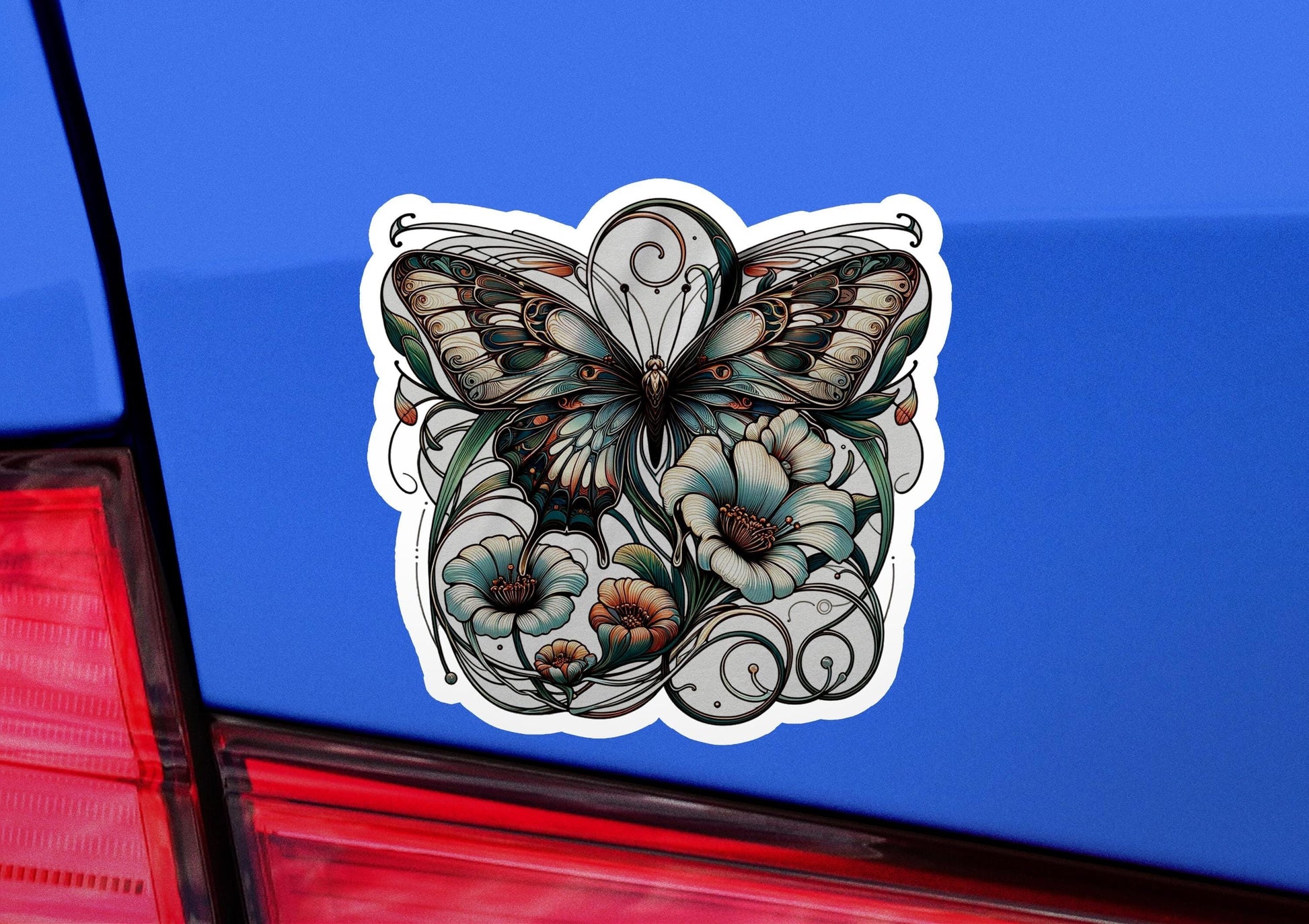 a sticker of a butterfly on a blue car