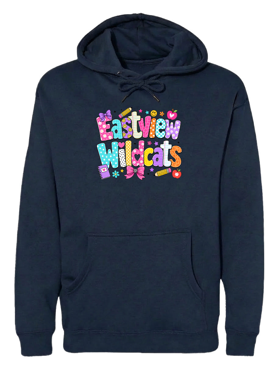 A navy blue hoodie with a colorful graphic design featuring the text "Eastview Wildcats" and various decorative elements such as hearts, stars, and flowers.
