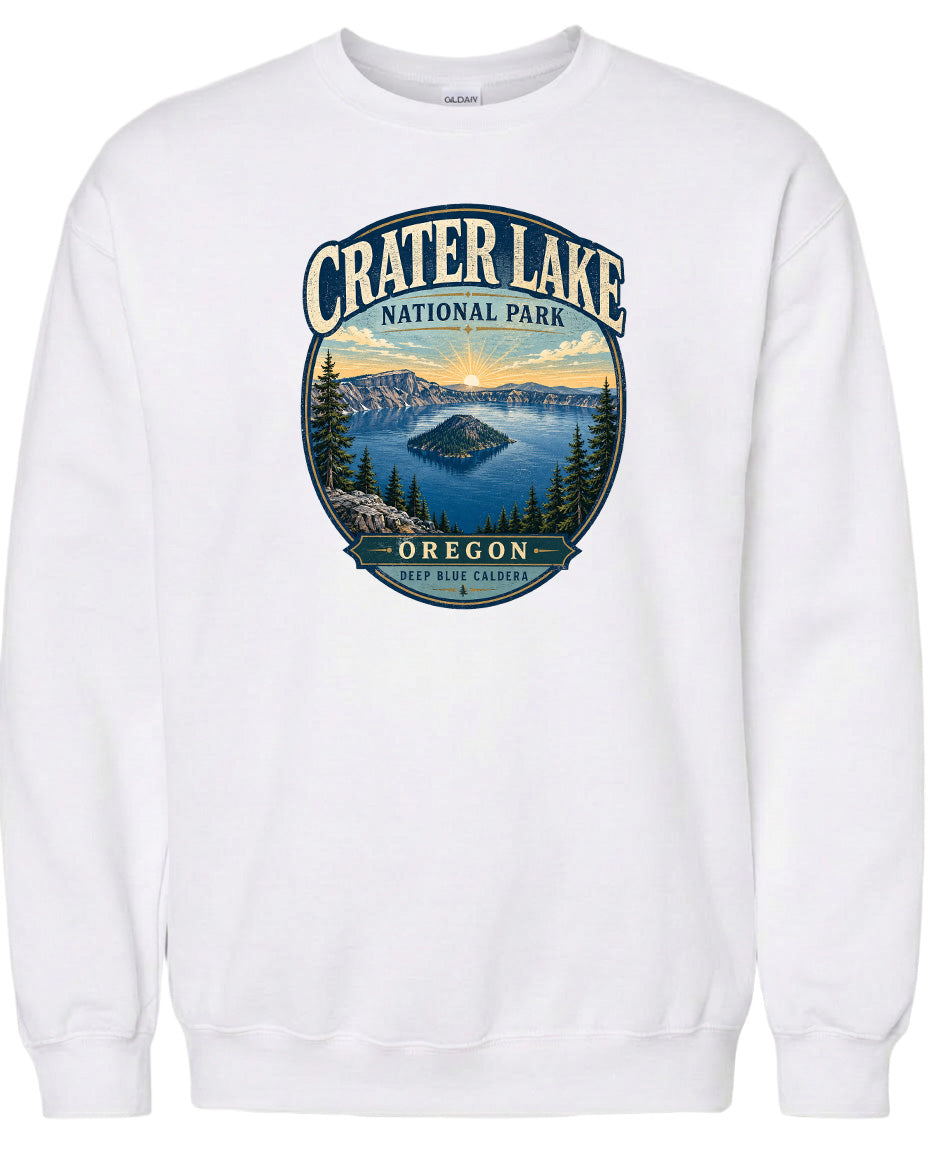 A white sweatshirt with a graphic design depicting Crater Lake National Park in Oregon.