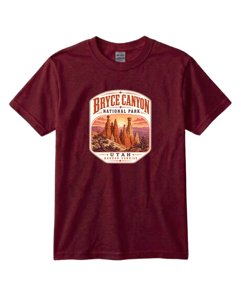 A burgundy-colored t-shirt with a graphic design depicting the Bryce Canyon National Park in Utah.