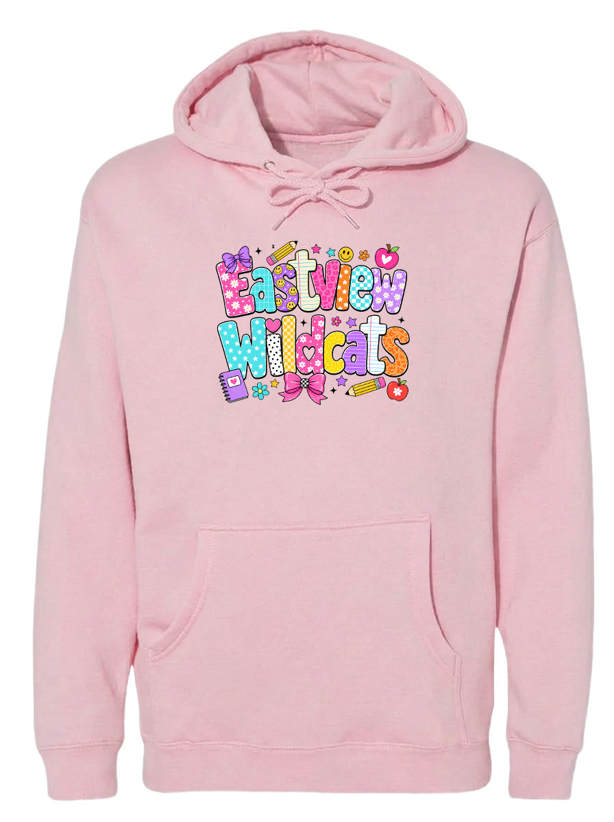 A pink hoodie with a colorful graphic design featuring the text "Eastview Wildcats" and various decorative elements.