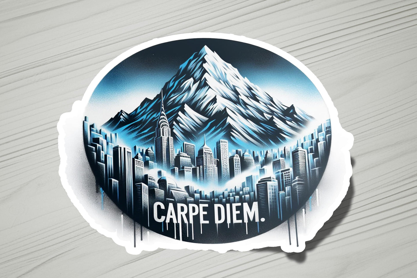 a sticker with a picture of a mountain and a city