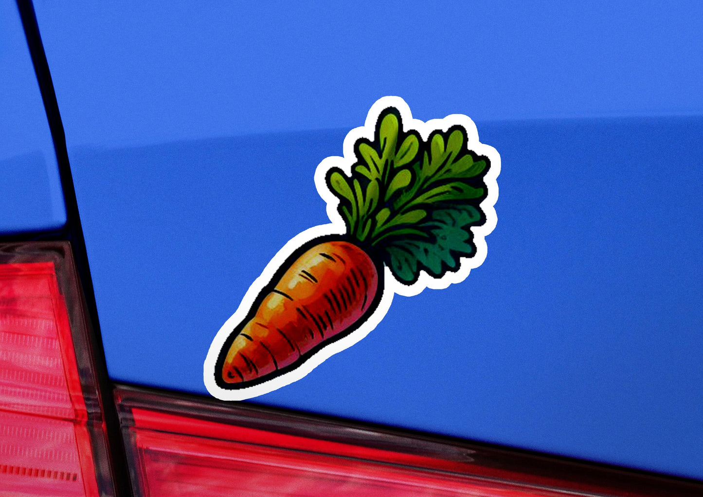 a sticker of a carrot on the back of a car