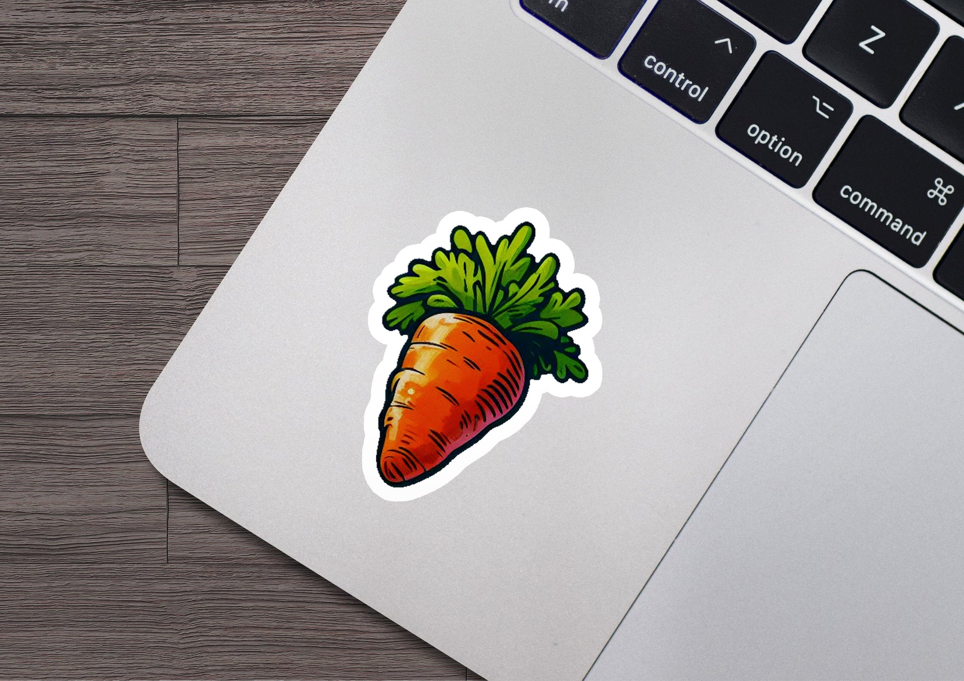 a sticker of a carrot on a laptop