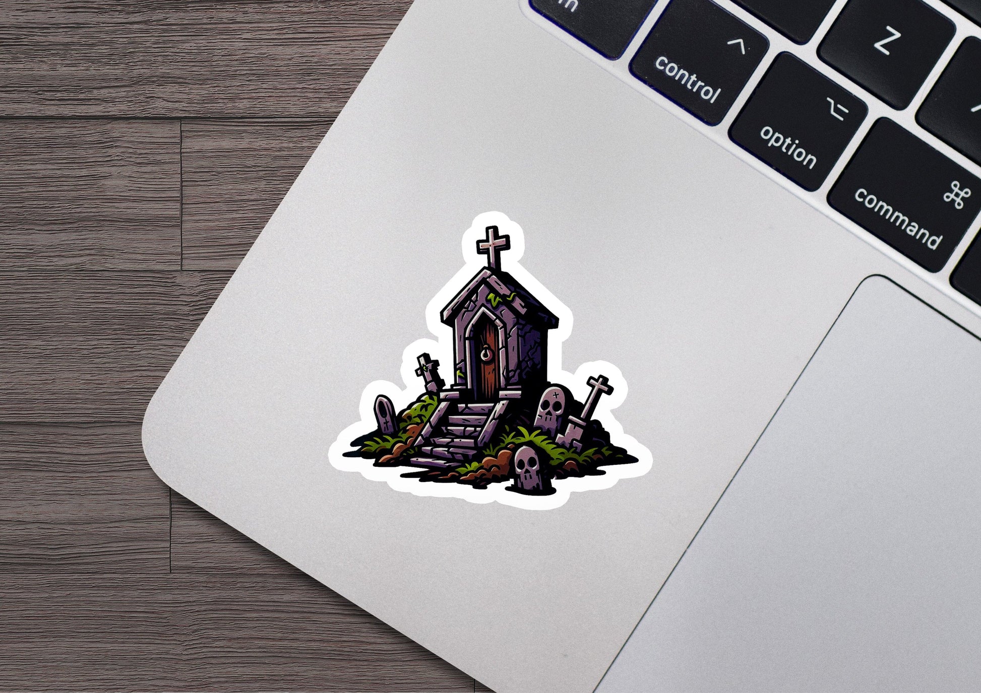 a laptop with a sticker of a church on it