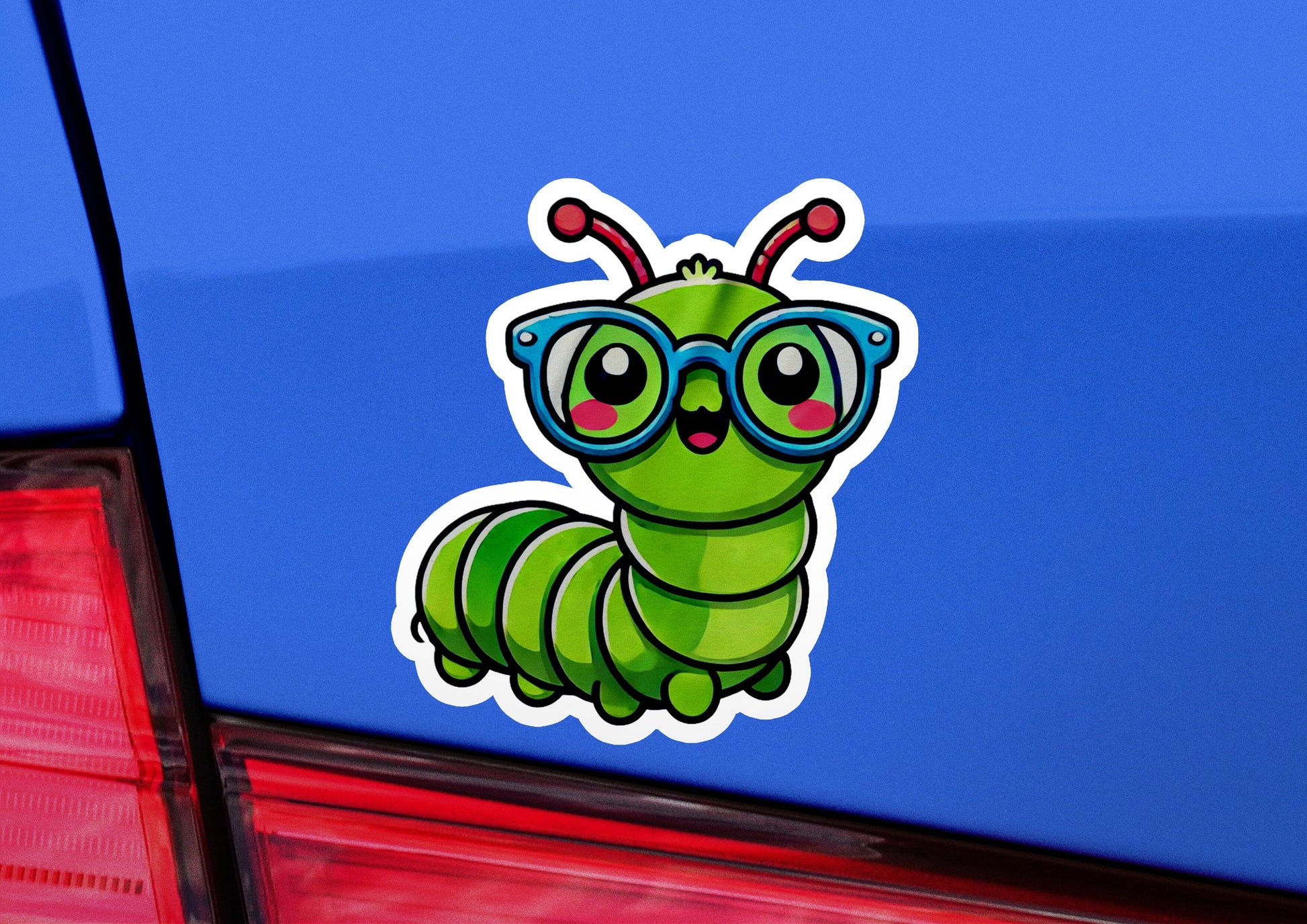 a close up of a car with a sticker of a caterpillar