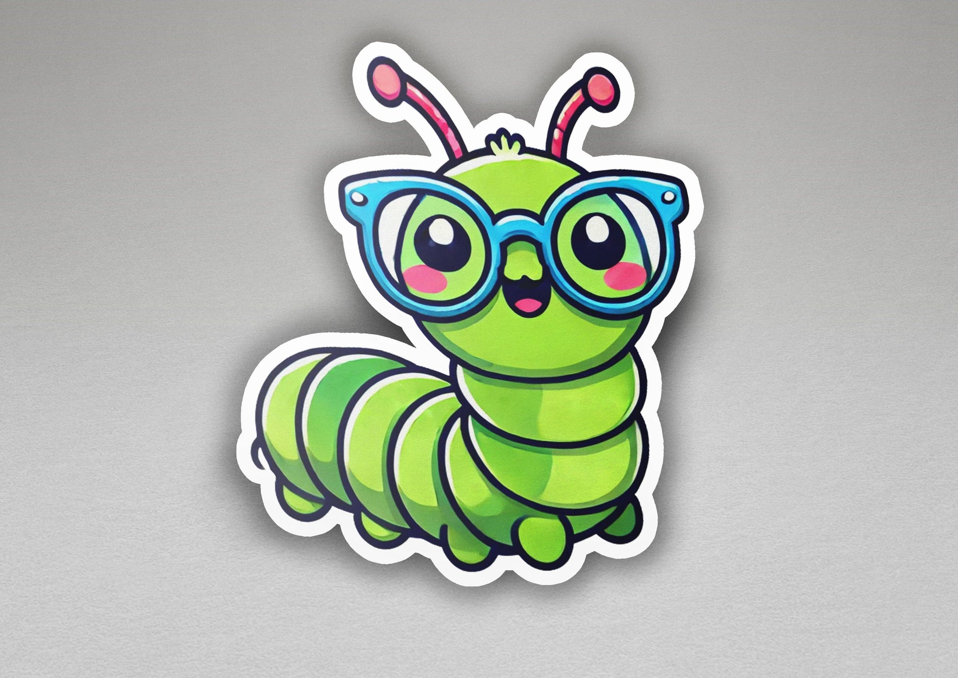 a sticker of a green caterpillar wearing glasses