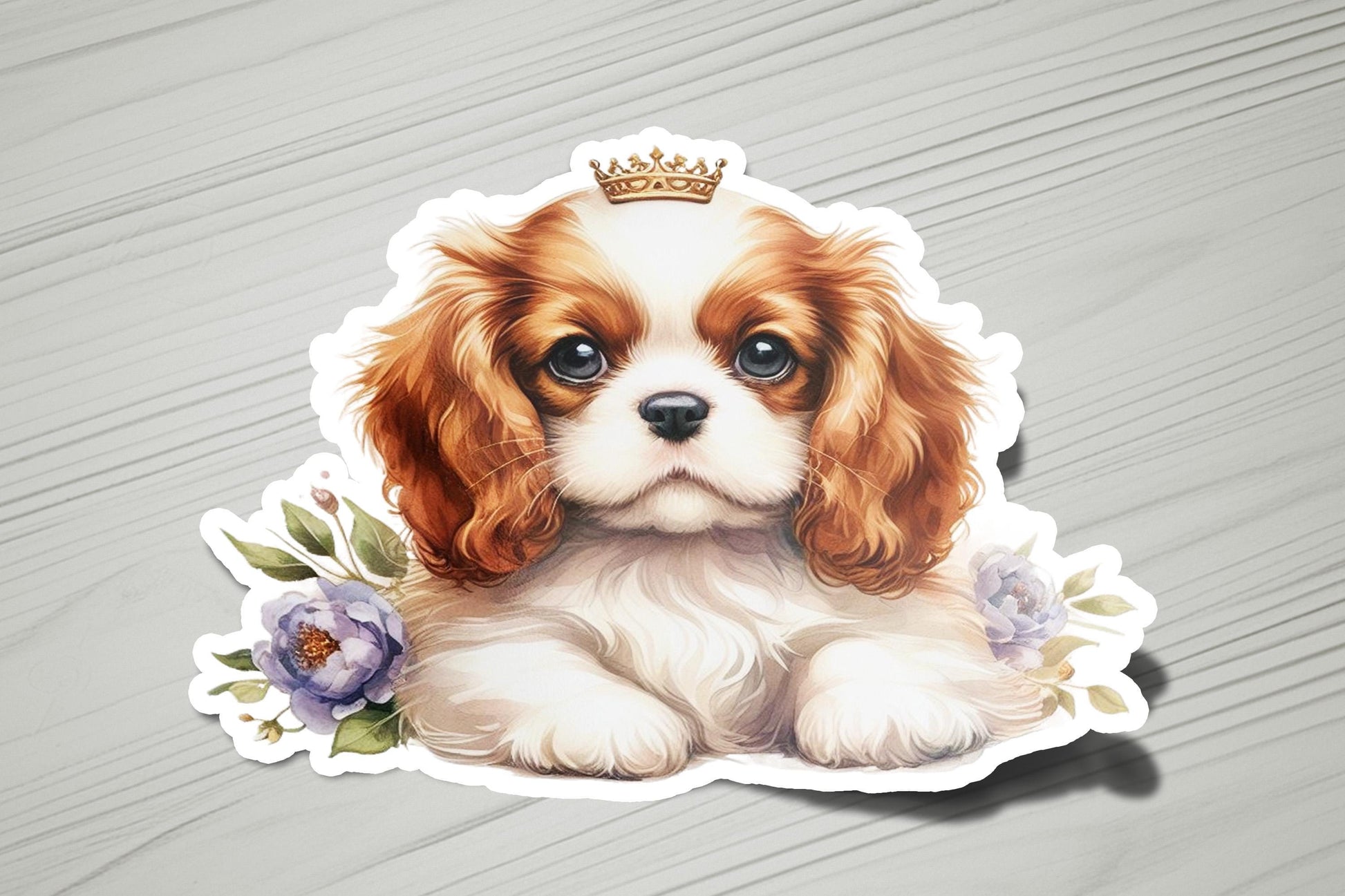a brown and white dog with a crown on top of it