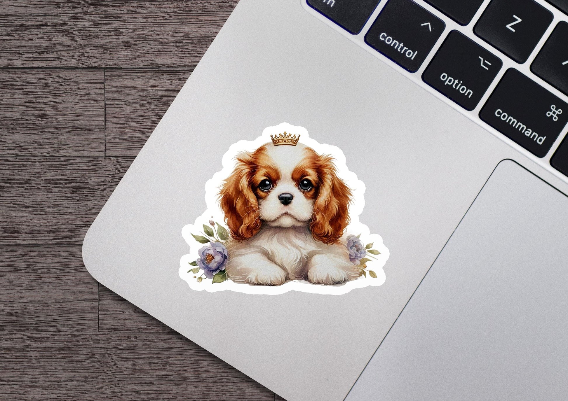 a sticker of a dog with a crown on it