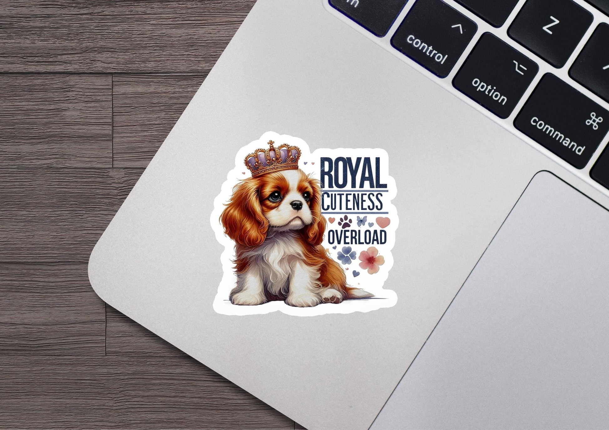 a sticker of a dog with a crown on its head
