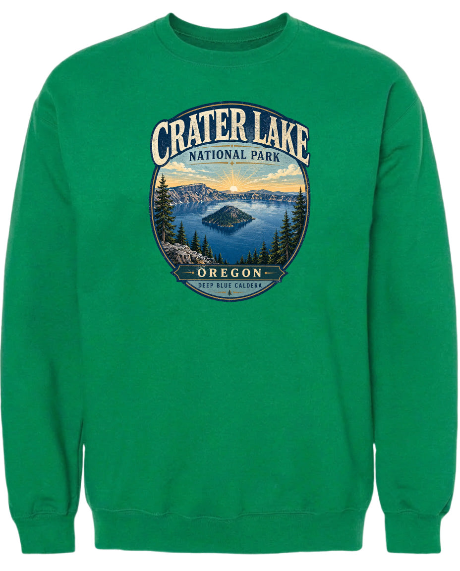 A green sweatshirt with a graphic design depicting Crater Lake National Park in Oregon.